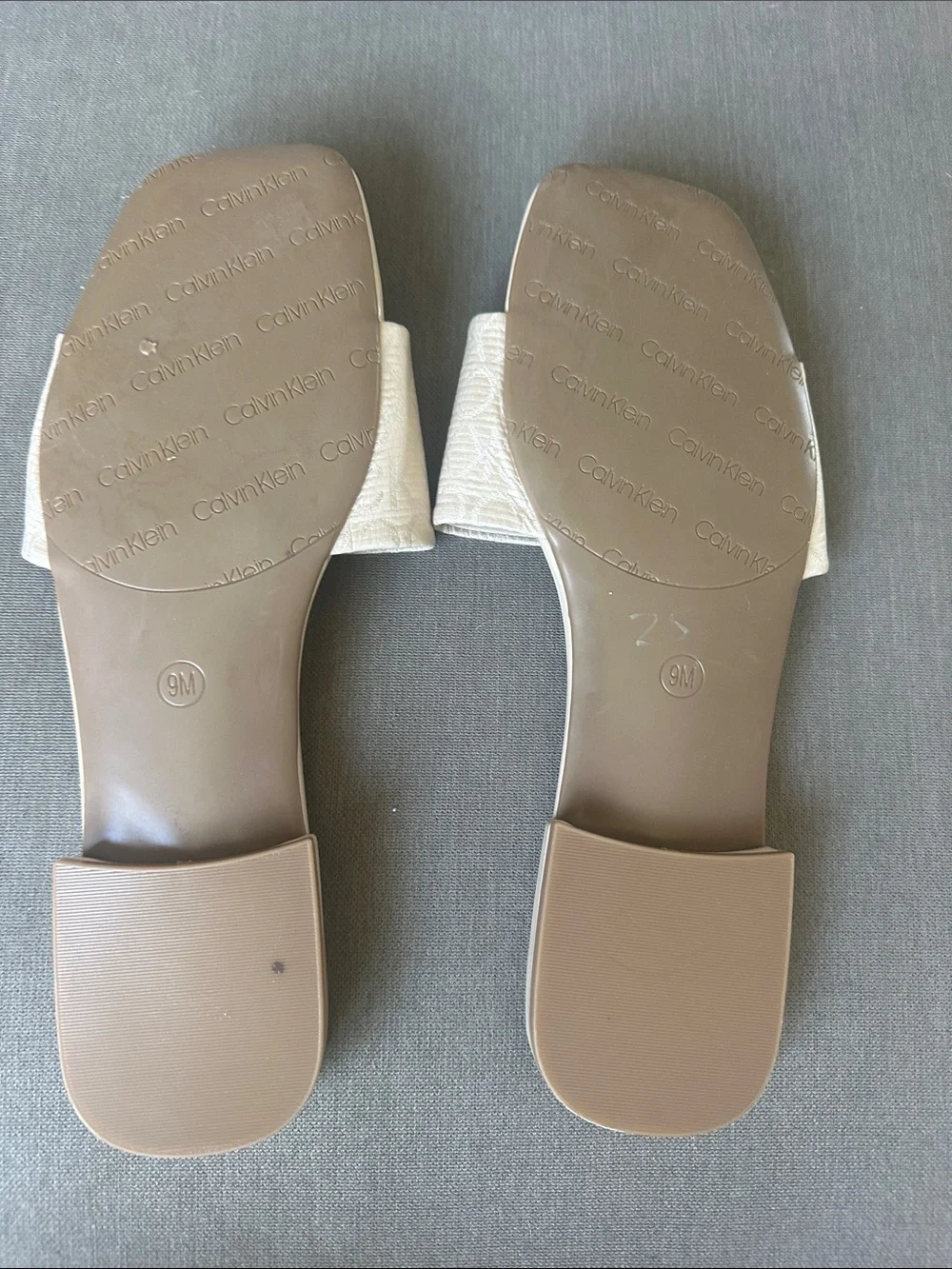 Calvin Klein Pearl White Embossed Logo Slide Sandals